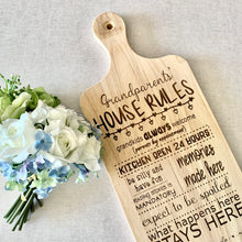 Load image into Gallery viewer, Grandparents House Rules Cutting Board Styled with Flower Bouquet
