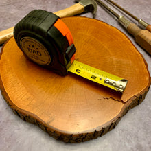 Load image into Gallery viewer, Tape measure standing up to show the ruler part