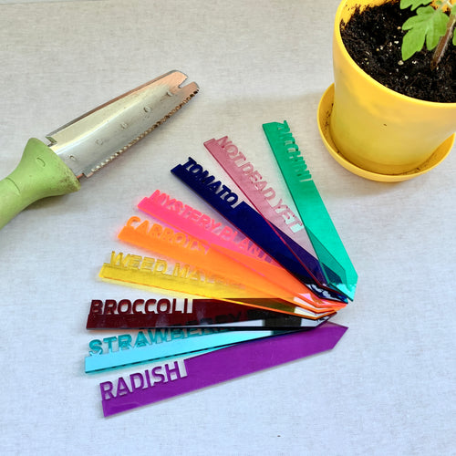 Acrylic Garden Stakes with potted plant and shovel