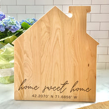 Load image into Gallery viewer, House Shaped Cutting Board with Home Sweet Home across the bottom and coordinates underneath
